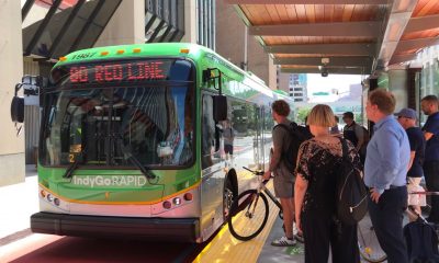 IndyGo Rapid bus pulls into the Red Line Statehouse Station.