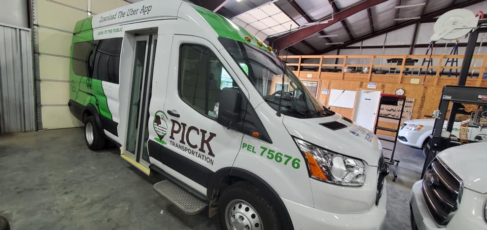 PICK Van sits in a garage awaiting a passenger.