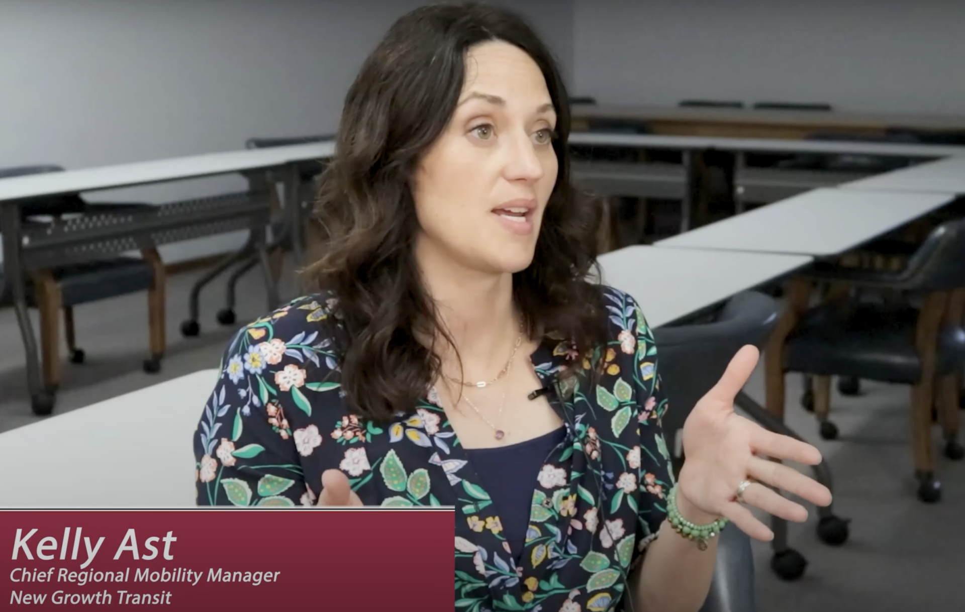 Kelly Ast talking to an interviewer off screen