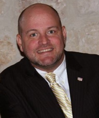 A headshot of Erich Orrick